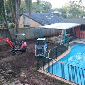Site clean and stormwater retrofit stopping lower level flooding.