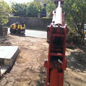 Driveway prep behind Hamilton Hotel.